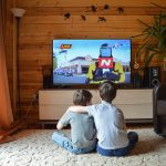 watching television